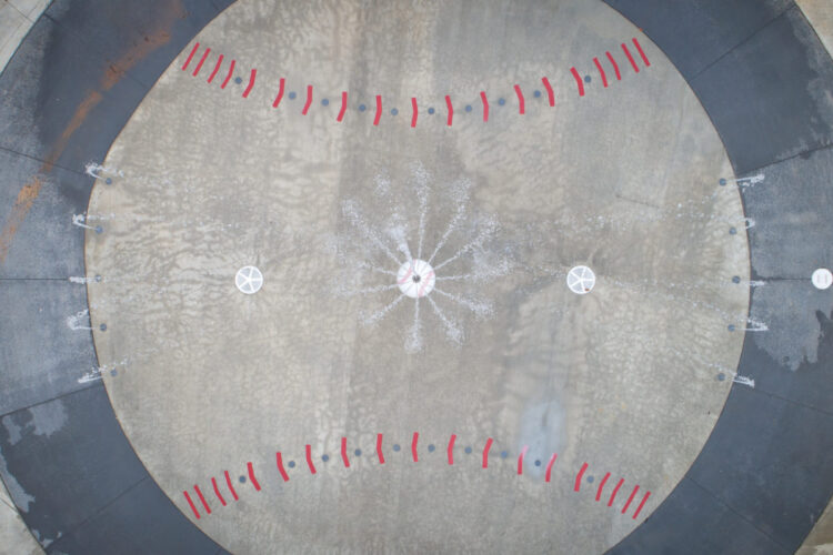 aerial view of splash pad that looks like a baseball from above